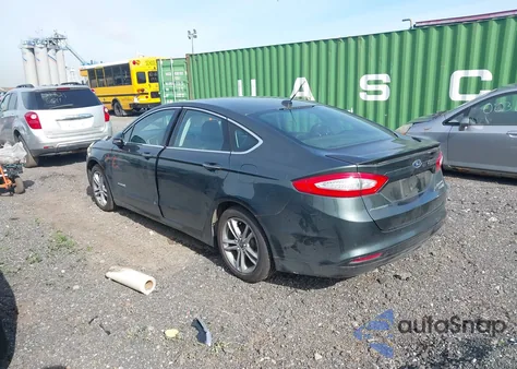 2016 Ford Fusion Hybrid Titanium from USA, damaged, VIN 3FA6P0RU8GR171770